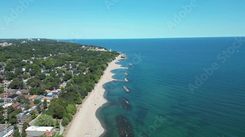 Aerial View of Toronto's Beaches Neighbourhood with Curved Sandy Coves and Deep Blue Lake Ontario