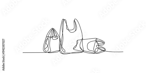 Continuous line drawing of reusable shopping bags on white background eco friendly