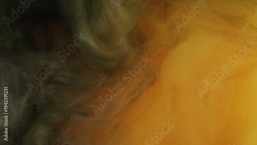 Paint blend. Color haze pigment. Defocused orange green yellow glitter dye vapor cloud smoke spreading on abstract art background.