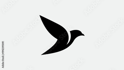 A black silhouette of a dove in mid-flight, wings outstretched, conveying peace and freedom
