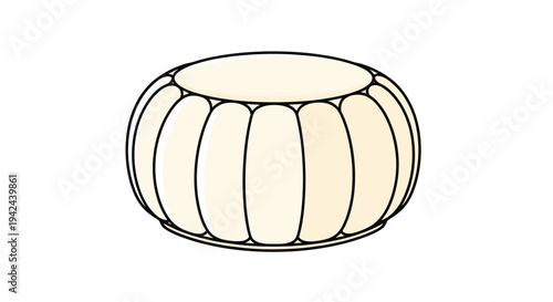 Beige round upholstered ottoman stool with a tufted design used for comfortable seating in a modern home interior.