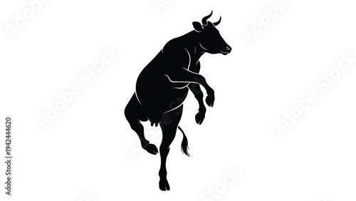 A black silhouette of a cow rearing up on its hind legs facing right