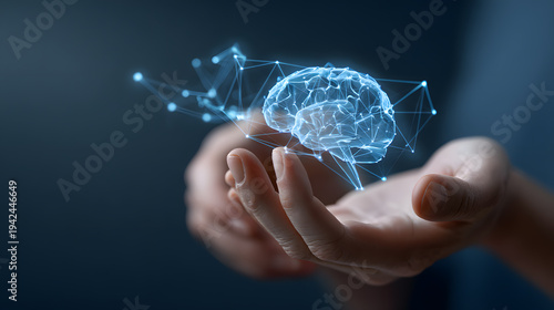 A 3D render of a glowing blue brain held gently in a person's palm, set against a dark background. The image signifies technology, knowledge and intelligence. 