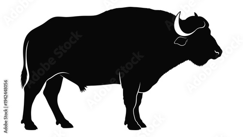 Silhouette of an african buffalo standing in profile facing right