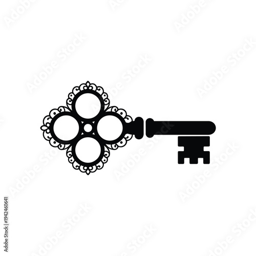 A detailed black silhouette of an ornate vintage style skeleton key