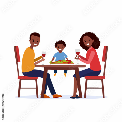 Happy African American family enjoying dinner together at table