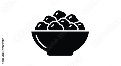 A simple black silhouette of a bowl filled with rounded objects