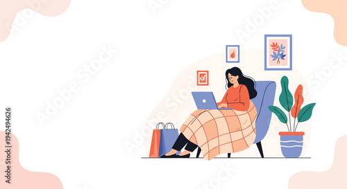 Woman works comfortably from home on her laptop while sitting in a chair and wrapped in a warm checkered blanket.