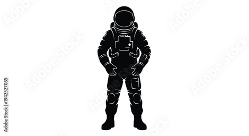 Silhouette of an astronaut standing with hands on hips