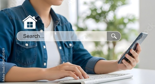 Searching for real estate online woman using mobile phone and keyboard home search concept app