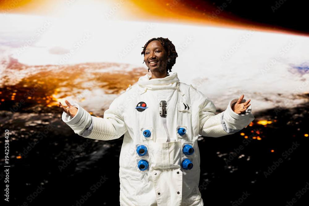 Fototapeta premium Cheerful orbital station astronaut delighted by beauty of planet in space. Jolly African american woman looking in awe at galaxy celestial bodies during planetary exploration research mission