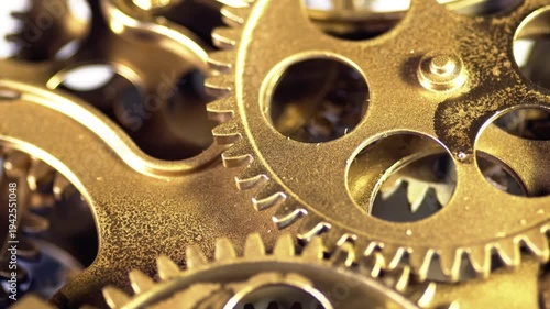 Close-up of intricate golden clockwork gears meshing together, symbolizing precision, time, and mechanical engineering in a detailed macro shot.