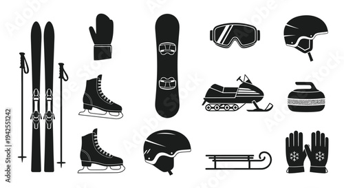 Winter sports equipment collection in black including skis boots and a silhouette