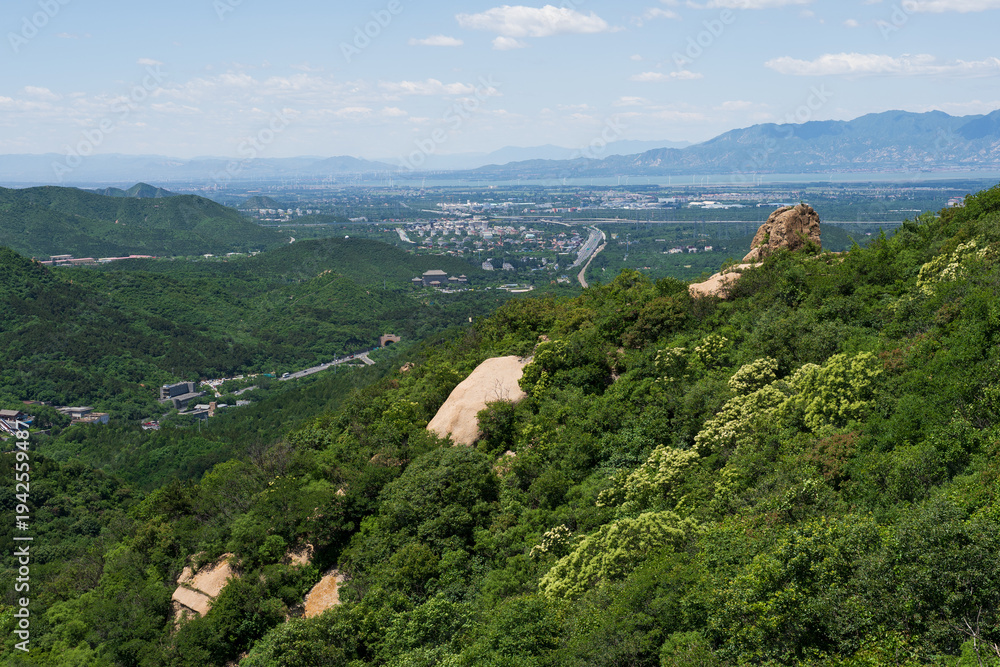 Fototapeta premium Mountain valley in the Yan Mountains overlooking countryside near Beijing