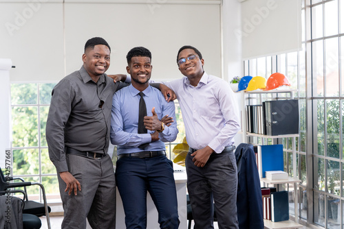 Business people smiling in office.