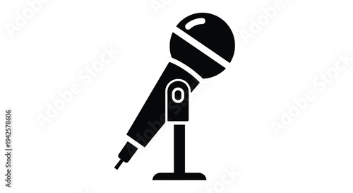A simple black and white illustration of a vintage microphone on a stand