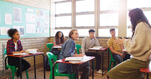 Fotografie Education, teacher and students in classroom at school for learning, knowledge or lesson
