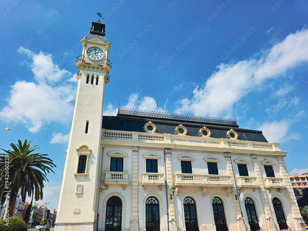 Obraz premium view of Edifici del Rellotge ( Clock Building) a historic landmark built in 1916, located in the port of Valencia
