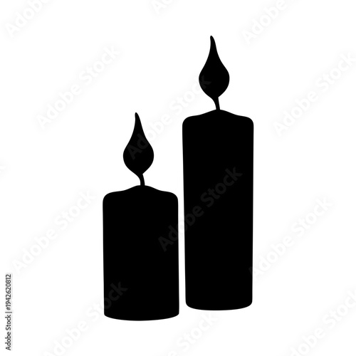 Silhouette of two lit candles with flickering flames against white background