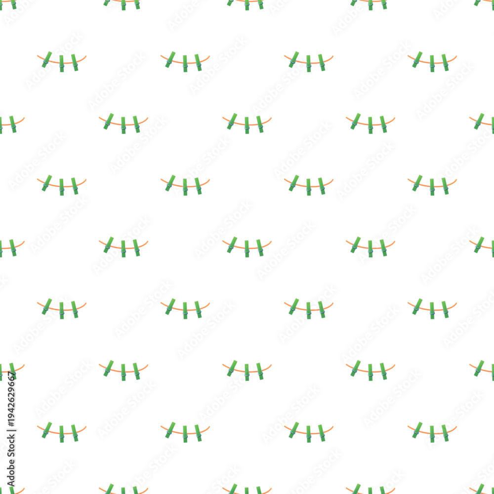 Fototapeta premium Green clothespins hanging on horizontal ropes creating a seamless background pattern