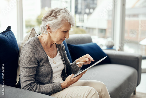 Canvas Print Old woman, credit card and tablet with stress on sofa in home for e commerce, frustrated or payment in lounge