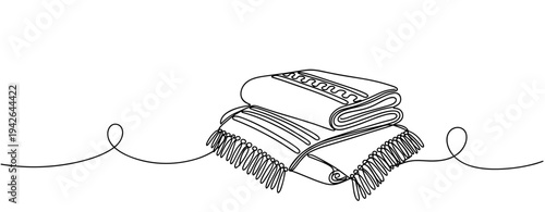 Folded fringed blankets stacked resting on continuous line background. none editable strokes