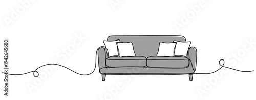 Sofa placed with pillows lying on plain white background