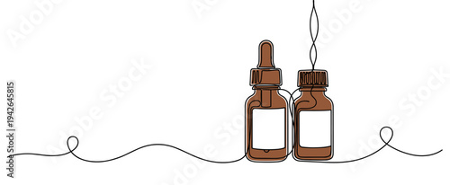 Amber dropper bottles standing on simple white background