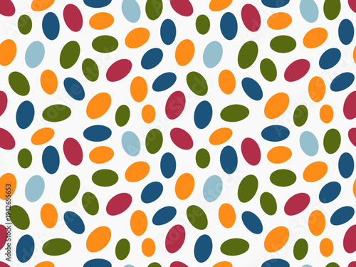 Seamless pattern of scattered oval shapes in vibrant autumn colors white background