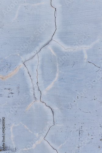ひび割れた青い壁のテクスチャ背景