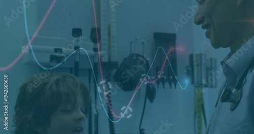 Smiling boy talking to doctor in exam room wearing collared shirt, with stethoscope, copy space