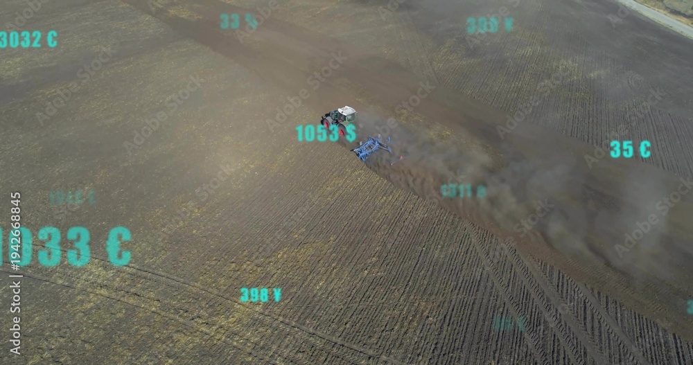 Naklejka premium Plowing cab tractor pulling blue harrow across furrows, raising dust plume showing teal data road