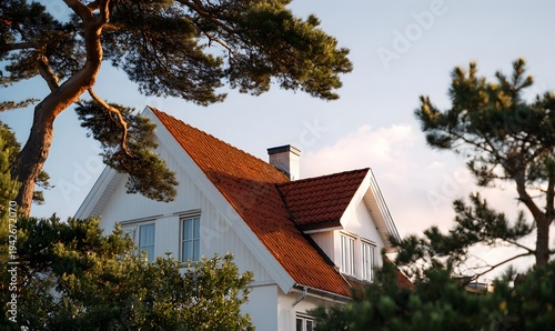 a suburban european house with a triangular roof