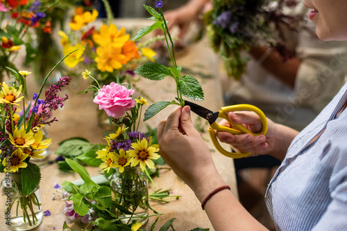 фотографія Colorful floral arrangement workshop scene