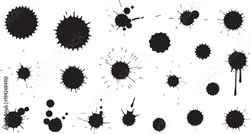 A varied collection of black ink splashes, circular splats, and fine spray droplets. 