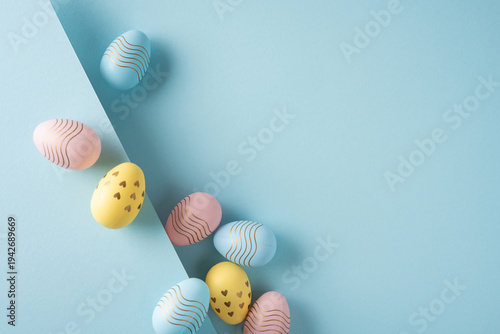 Happy Easter pastel egg arrangement on folded paper background with gold accents and soft shadows conveying spring celebration and gentle minimal design