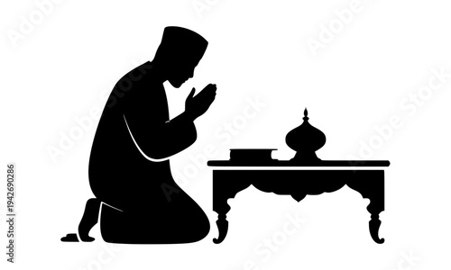 Muslim man silhouette kneeling in prayer with hands raised in dua pose beside a prayer table, ideal for Islamic, Ramadan, and religious faith design concepts.