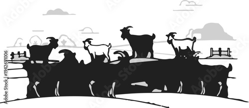 A group of goats standing on a dark landscape under a cloudy sky