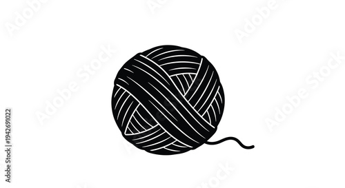 Black yarn ball with trailing end a striking graphic silhouette