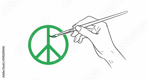 A hand paints a green peace symbol on a white background