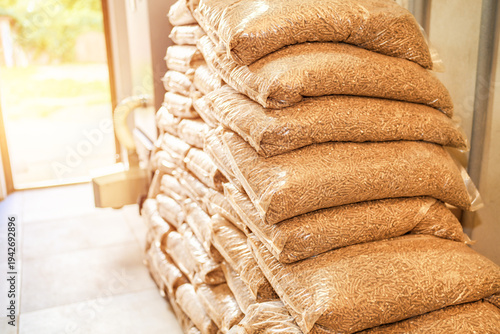Canvas Print Large pile of bags for pellet heating system