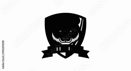 A black, stylized wild boar head emblem within a shield