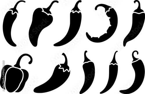 Collection of black chili pepper and bell pepper silhouettes white background