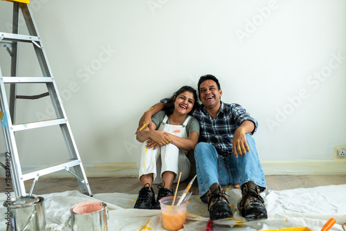 Photography Couple enjoying home renovation