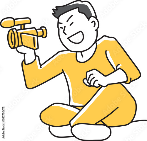 ビデオカメラのプレビューを見る男性