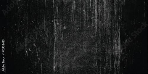 Abstract black and white grunge texture background with vertical scratches and dust particles