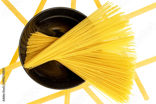 Photography Uncooked spaghetti isolated on white background, close-up.