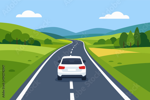 White car driving on open asphalt road in countryside