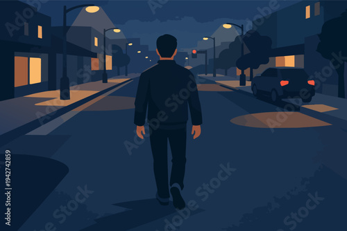 Man walking alone on dark city street at night