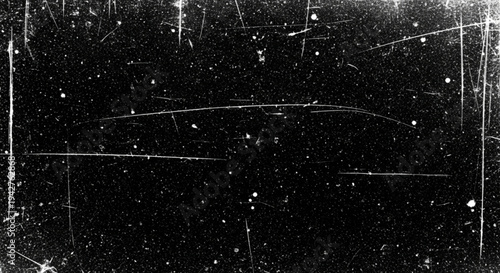 Dark cinematic background with prominent white scratches on the edges and scattered dust particles for a retro film aesthetic.